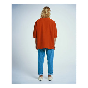 Homecore - Tajima Seer Zip Polo | Brick Red
