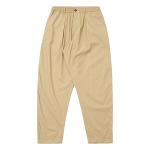 Universal Works - Pleated Track Poly Tech Trousers | Beige