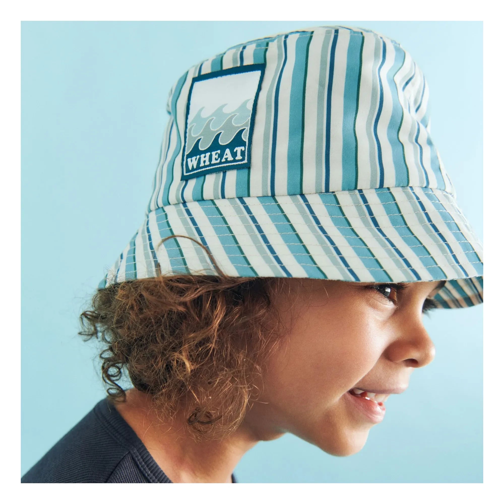 Wheat - Bob Tilo Striped Badge Recycled Fibers | Blue